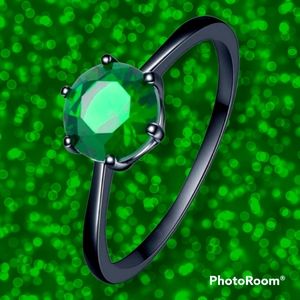 Emerald Green CZ solid black ring.